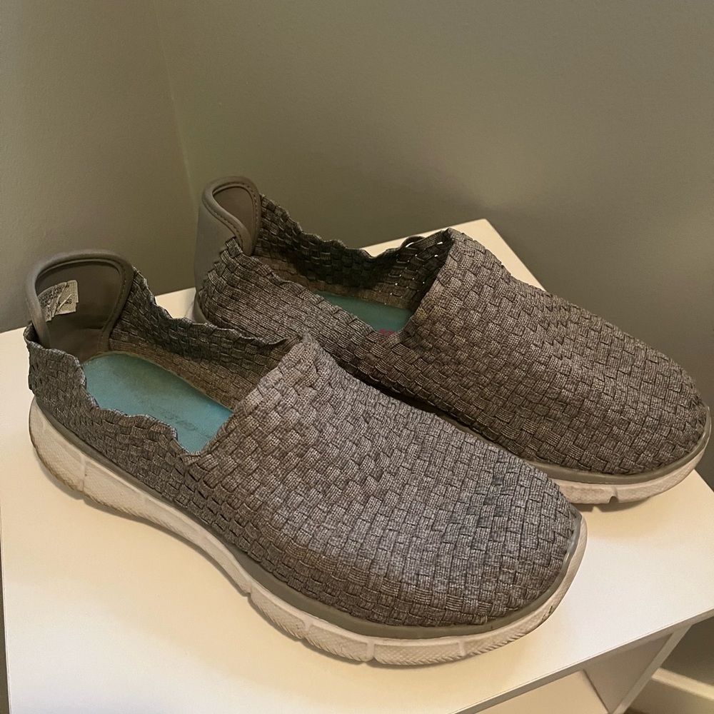 Sketchers with memory foam insoles.